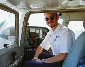 Student pilot seated in aircraft