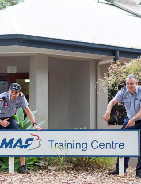 Two pilots after completing training at Mareeba